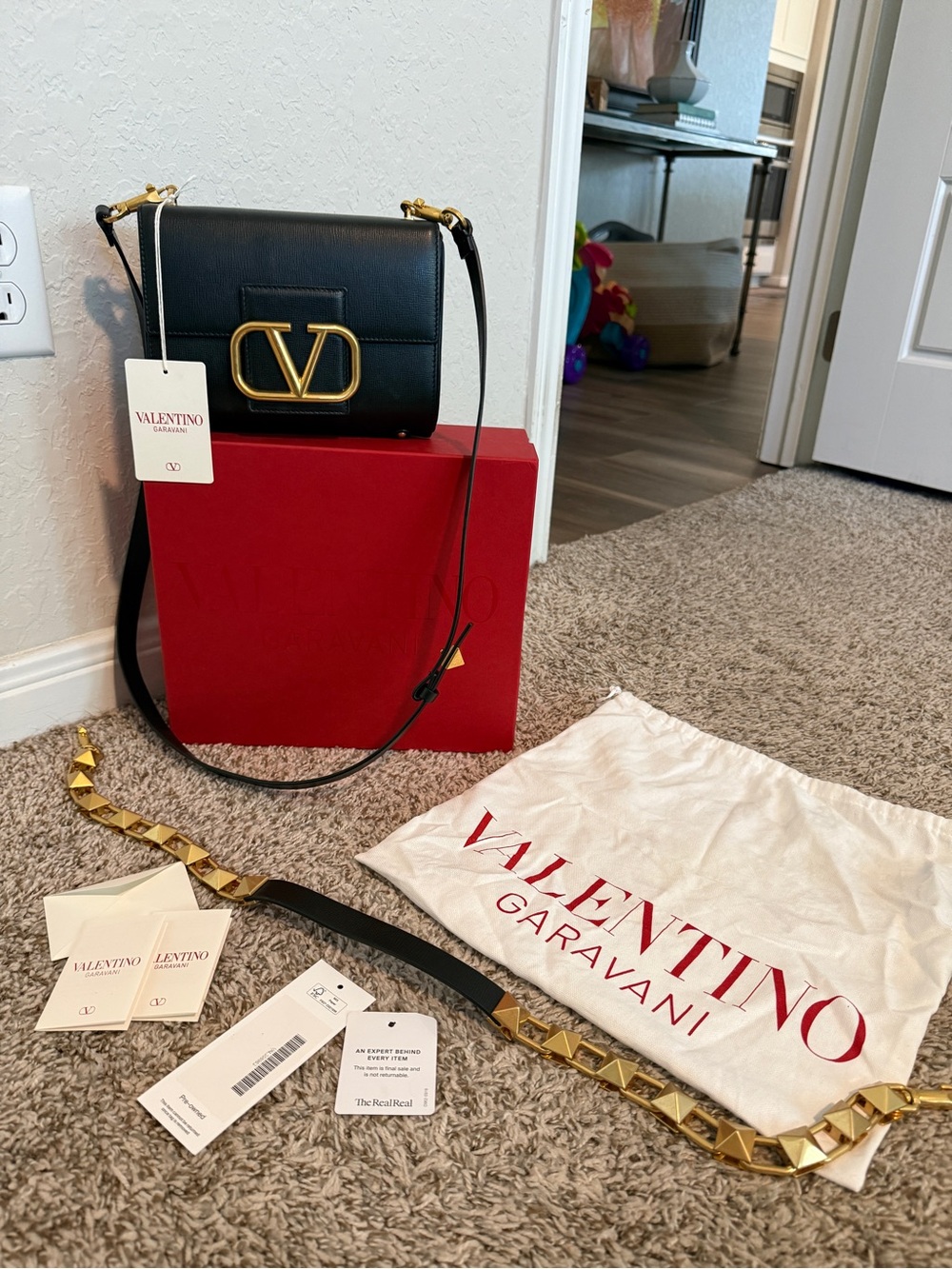 Valentino Garavani Black Leather Crossbody with Gold V-Logo